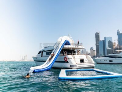 Yacht Charter In Dubai – 82ft Yacht – 50 PAX - Food, Waterslides & Inflatables Available