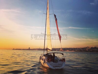 Sunset 2 hour shared boat tour in Lisbon