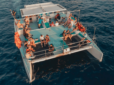 Los Cabos Sunset Catamaran Cruise with Open Bar & Light Snack